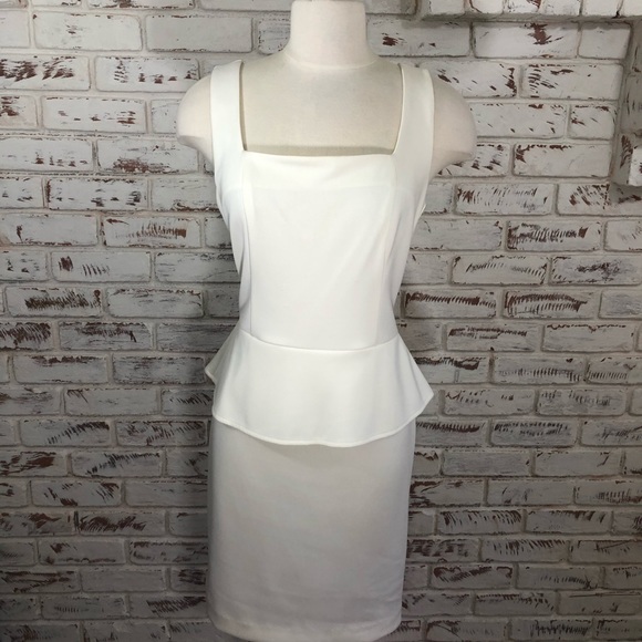 ECI Dresses & Skirts - Off White Peplum Dress